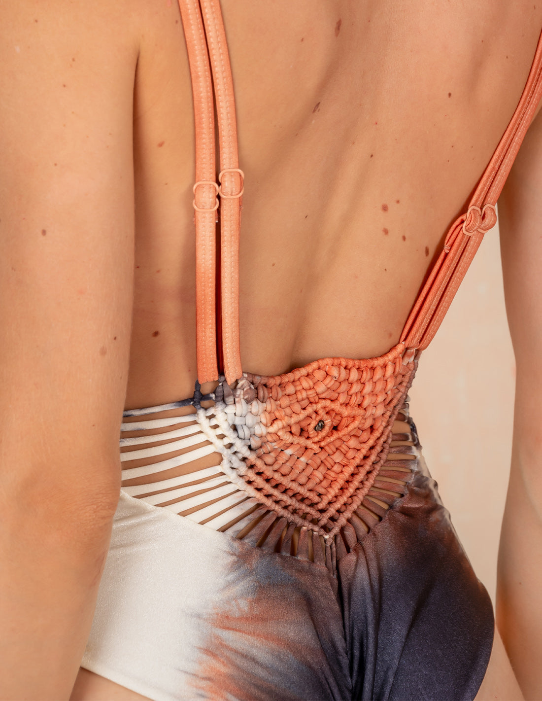 Ocus One-Piece Salmon + Black. Hand-Dyed One-Piece Swimsuit With Hand Woven Macramé In Salmon + Black. Entreaguas